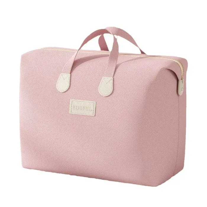 Sac polochon rose souple : parfait pour les voyages