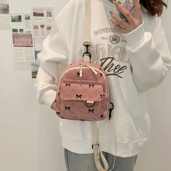Mini sac à dos doux fille nœud papillon imprimé sac à bandoulière voyage sac de rangement cosmétique Version coréenne Ins Bookbags sac à dos décontracté
