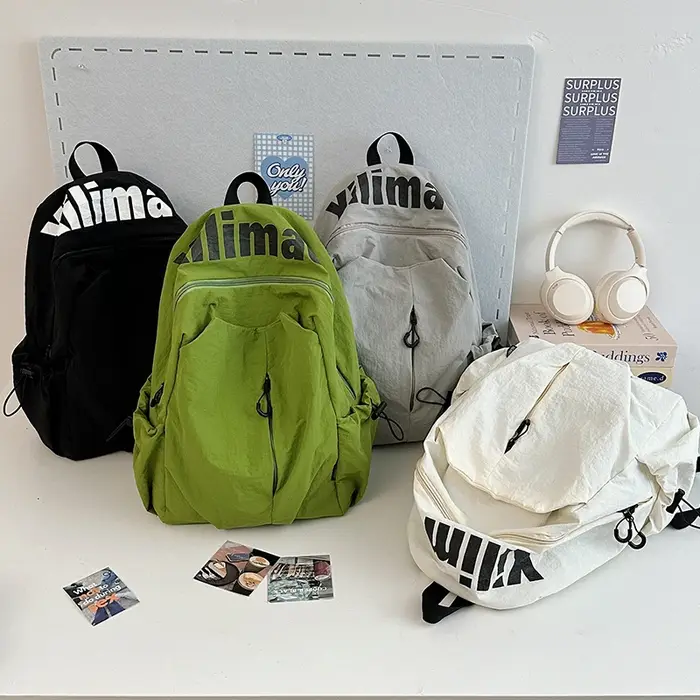 Sac à dos décontracté, mode Simple grande capacité hommes et femmes avec le même Style sac à dos de transport