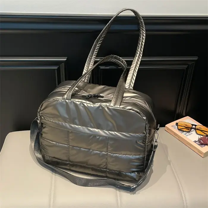 Sac de voyage matelassé de couleur unie