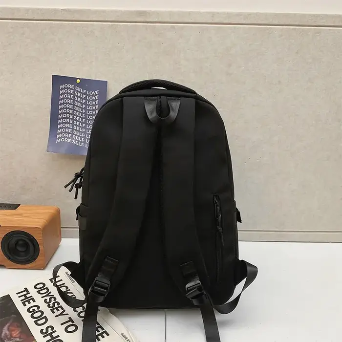 Sac à dos de grande capacité de couleur unie, sac noir simple pour étudiants et voyages