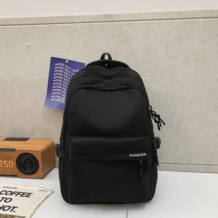 Sac à dos de grande capacité de couleur unie, sac noir simple pour étudiants et voyages
