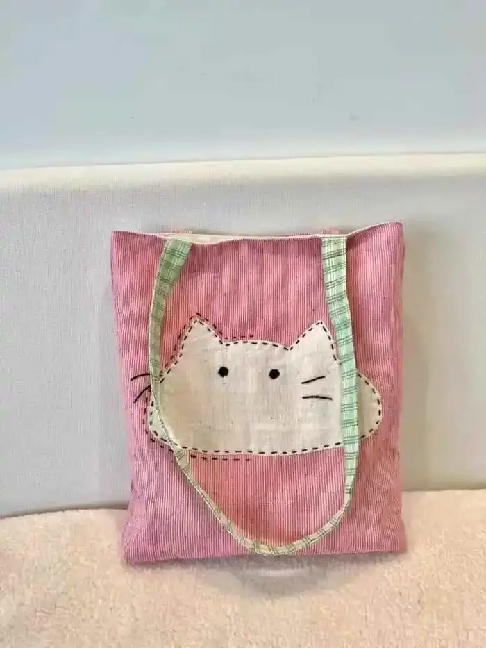 2025 nouveau sac en tissu à bandoulière unique japonais polyvalent et simple sac en toile pour femmes sac de transport artistique chat de dessin animé mignon
