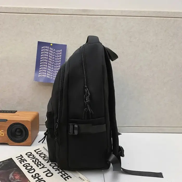 Sac à dos de grande capacité de couleur unie, sac noir simple pour étudiants et voyages