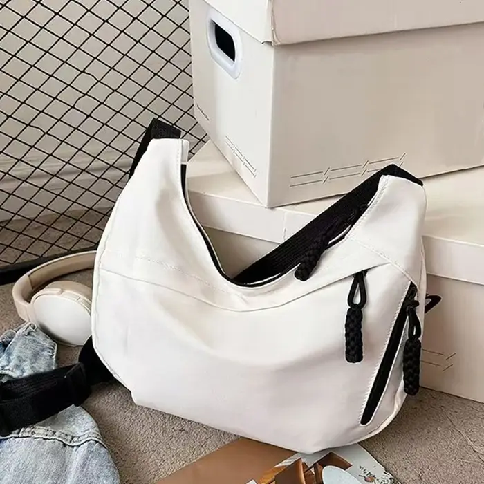 Sac à bandoulière de style neutre pour hommes et femmes, adapté aux sorties décontractées et aux tra