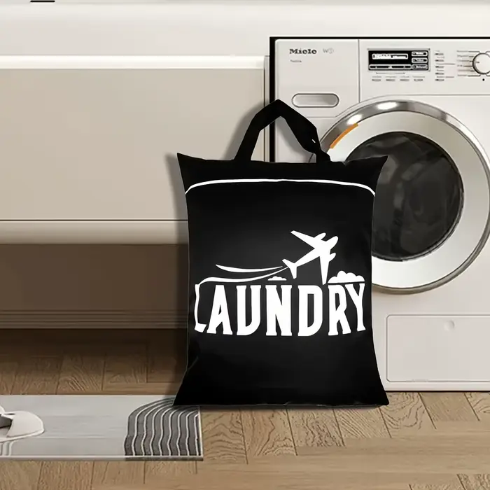 1 grand sac à linge de voyage avec poignée