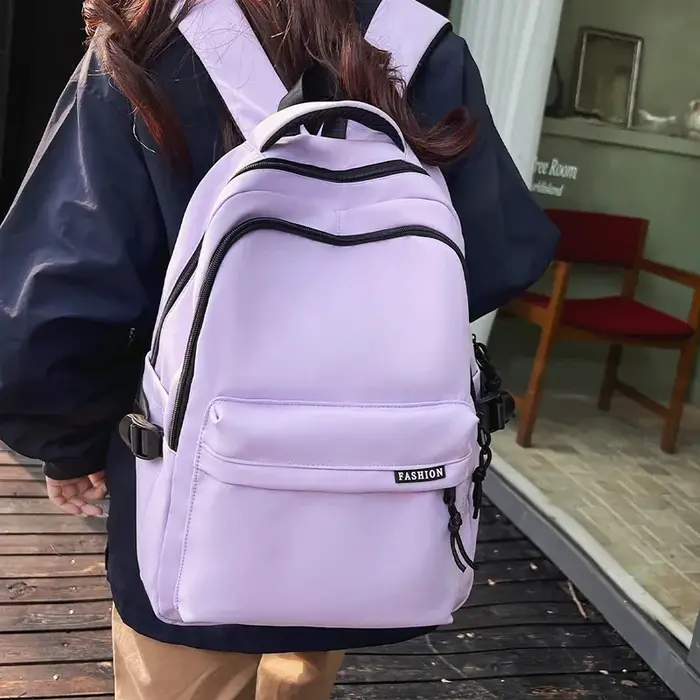 Sac à dos de grande capacité de couleur unie, sac noir simple pour étudiants et voyages