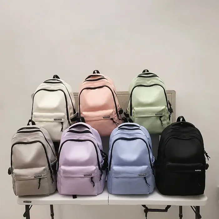 Sac à dos de grande capacité de couleur unie, sac noir simple pour étudiants et voyages