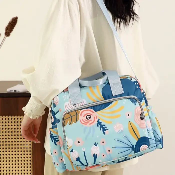 Sac à dos de voyage pour bébé - Grande capacité, portable, avec bandoulière et motif imprimé, idéal pour les sorties.