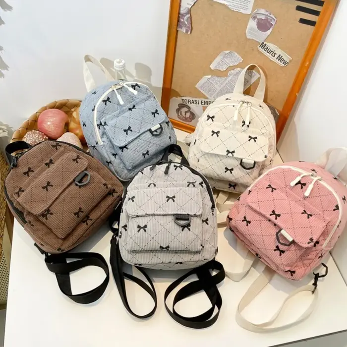 Mini sac à dos doux fille nœud papillon imprimé sac à bandoulière voyage sac de rangement cosmétique Version coréenne Ins Bookbags sac à dos décontracté