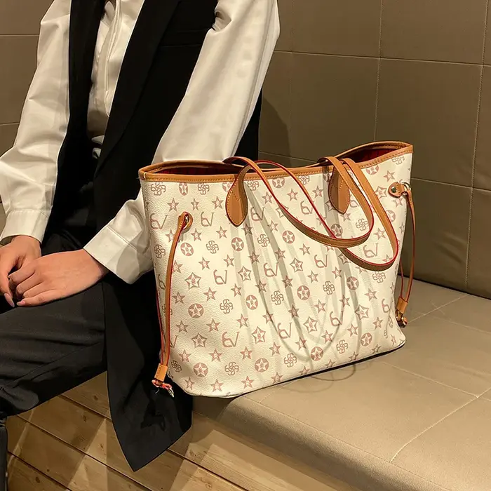 Sac à langer élégant en cuir, sac à main bandoulière pour femme, sac fourre-tout à l'épaule, célèbre