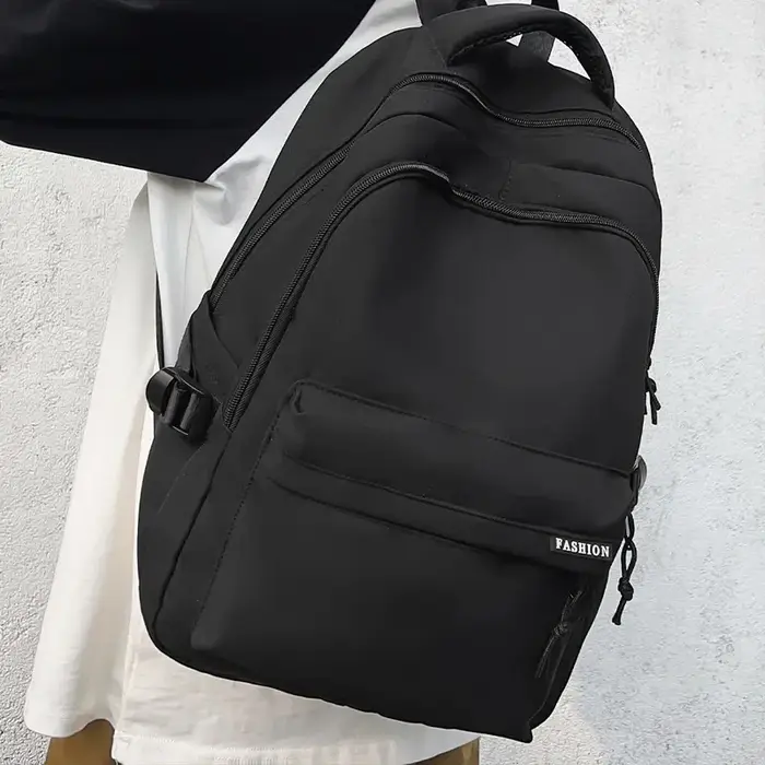 Sac à dos de grande capacité de couleur unie, sac noir simple pour étudiants et voyages