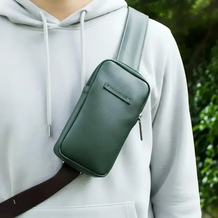 Sac à bandoulière avec poche pour téléphone sur sangle