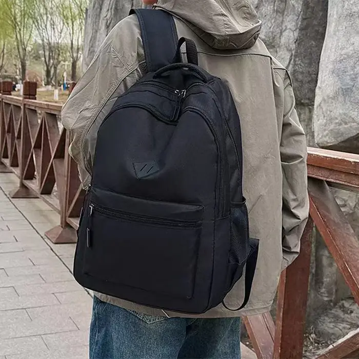 Nouveau sac à dos noir à la mode sac d'école décontracté pour les déplacements quotidiens voyages en plein air cadeaux de Festival