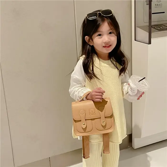 Sac à dos rétro style universitaire pour enfants, sac à dos carré en PU à double bandoulière avec motif petit ours de dessin animé pour garçons et filles, sac à main de loisirs pour bébé