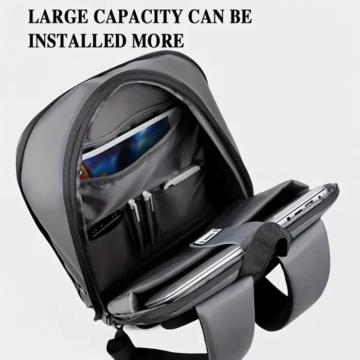 Un sac à dos d'affaires uni pour hommes avec une sangle de bagage pour les déplacements domicile-travail.