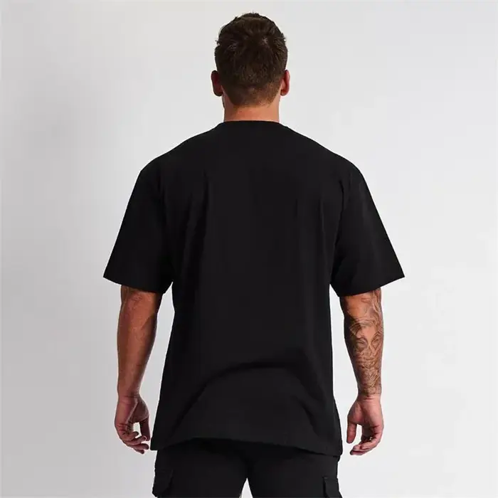 Couleur unie Gym course Sport vêtements Fitness surdimensionné chemise en coton ample hommes Hip Hop à manches courtes musculation Muscle T-shirt