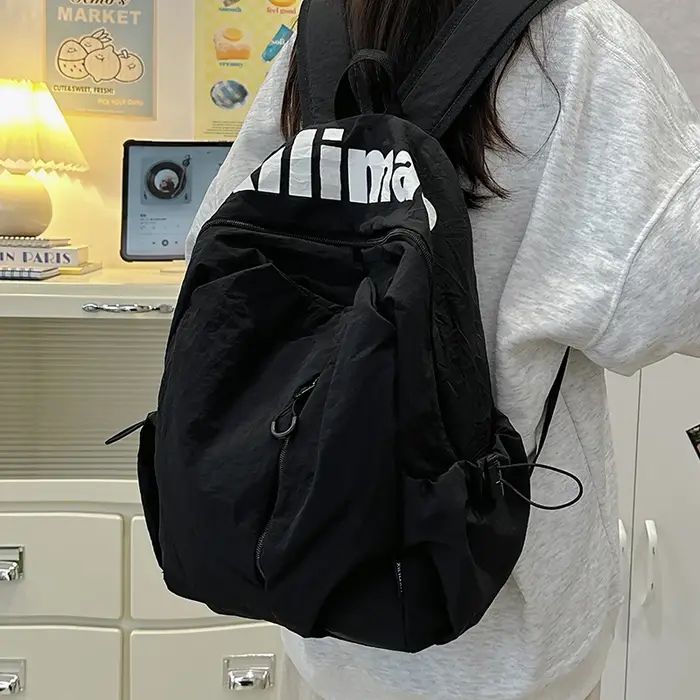 Sac à dos décontracté, mode Simple grande capacité hommes et femmes avec le même Style sac à dos de transport