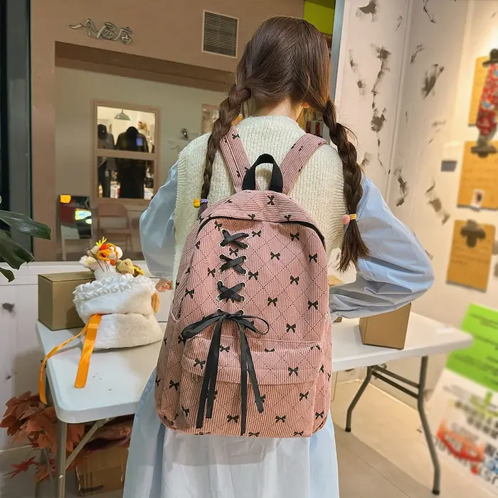 Sac à dos de loisirs en velours côtelé avec nœud, grande capacité, style universitaire, pour le printemps et l'été, idéal pour les trajets quotidiens