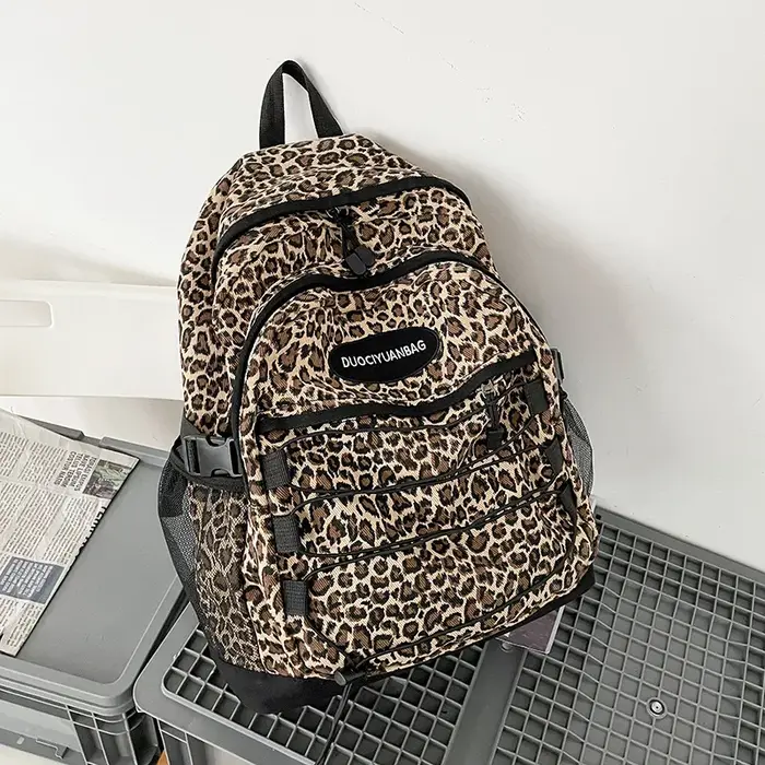 Sac à dos vintage à imprimé léopard, grande capacité, sac d'école avec poche latérale en maille, pou