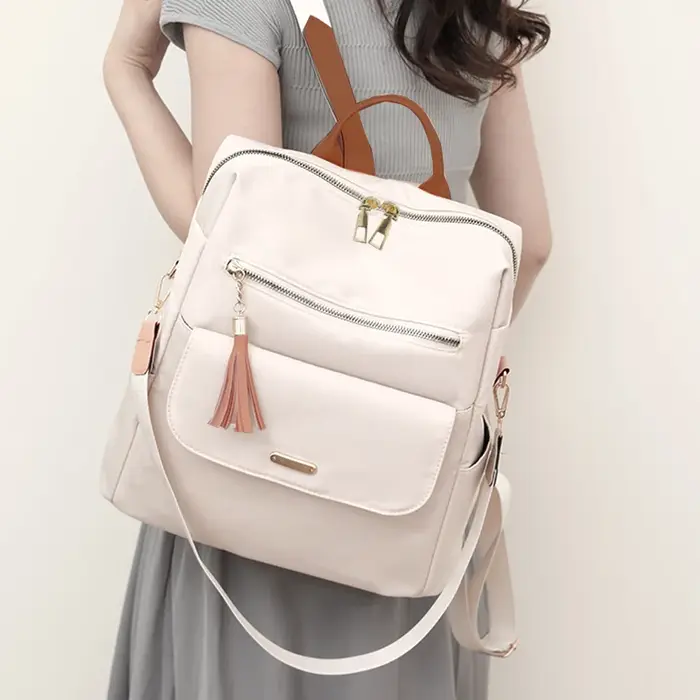 Sac à dos de style neutre pour hommes et femmes, adapté aux voyages, au tourisme, à la photographie et aux étudiants comme cartable.