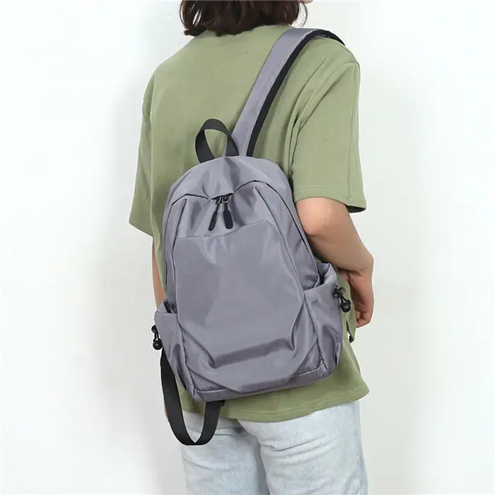 Mini sac à dos en toile imperméable pour homme